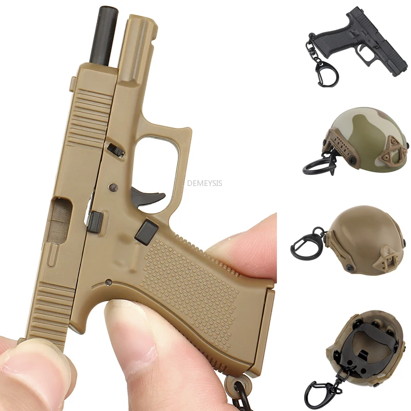 Photography Magazine - Mini llavero con forma de pistola
